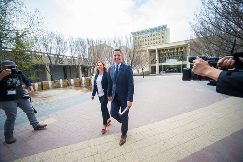 MIKAELA MACKENZIE / WINNIPEG FREE PRESS
Mayor Brian Bowman and his wife, Tracy Bowman, walk to the clerk's office to register to seek re-election at City Hall in Winnipeg on Friday, May 11, 2018. 
Mikaela MacKenzie / Winnipeg Free Press 2018.