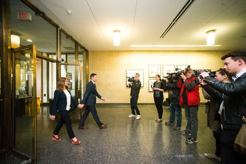 MIKAELA MACKENZIE / WINNIPEG FREE PRESS
Mayor Brian Bowman and his wife, Tracy Bowman, walk out of the clerk's office after registering to seek re-election at City Hall in Winnipeg on Friday, May 11, 2018. 
Mikaela MacKenzie / Winnipeg Free Press 2018.