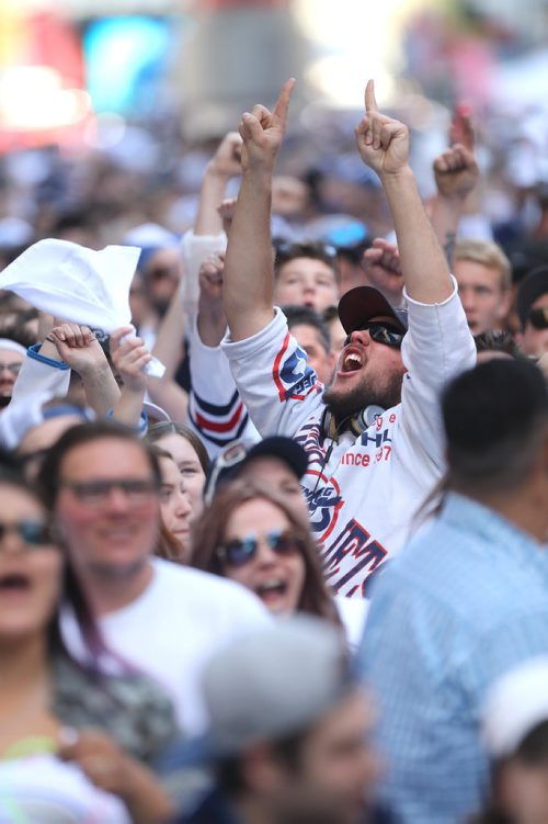 RUTH BONNEVILLE / WINNIPEG FREE PRESS
Thousands of Winnipeg Jets fans scream at the start of the Winnipeg Jets vs Vegas Golden Knights game outside Bell MTS Place on Donald Street during the fan party Saturday.

May 12,  2018
