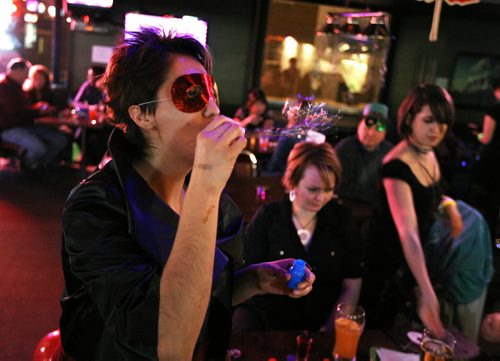 Brandon Sun Karla Ortega blows bubbles during a New Year's Eve party at Clancy's pub, Wednesday night. (Colin Corneau/Brandon Sun)