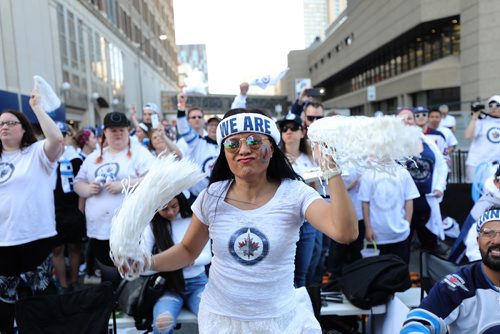 RUTH BONNEVILLE / WINNIPEG FREE PRESS

Melanie Ilag dances to the music of Big City All Star Band on stage on Donald Street with thousands of Winnipeg Jets fans during the fan street party just prior to the start of the Winnipeg Jets vs Vegas Golden Knights game Saturday.


May 12,  2018
