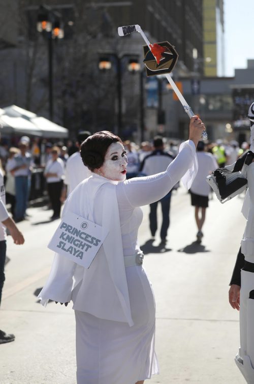RUTH BONNEVILLE / WINNIPEG FREE PRESS


Joanne Fershau - Princess Knight Slaya waves her hockey stick as a wand  during the fan street party just prior to the start of the Winnipeg Jets vs Vegas Golden Knights game Saturday.


May 12,  2018
