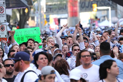 RUTH BONNEVILLE / WINNIPEG FREE PRESS

Thousands of Winnipeg Jets fans scream at the start of the Winnipeg Jets vs Vegas Golden Knights game outside MTS Centre on Donald Street during the fan party Saturday.



May 12,  2018
