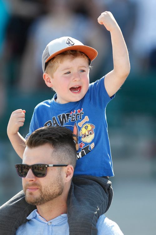 JOHN WOODS / WINNIPEG FREE PRESS
Terry Bremner looks on as his son Jaxsen cheers on his horse in race seven on opening day of races at Assiniboia Downs in  Winnipeg Sunday, May 13, 2018.