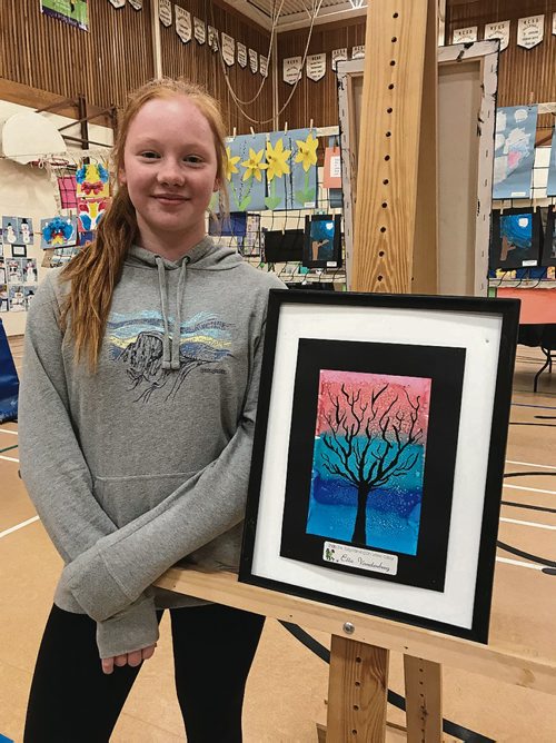 Canstar Community News Ella Vandenberg, a Grade 6 student at Calvin Christian School, painted a watercolour of a tree in art class, which was featured in the school's art show May 10 and 11. (SHELDON BIRNIE/CANSTAR/THE HERALD)