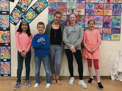 Canstar Community News (From left) Belen Infantes, Johann Strumphen, Brittany Fraser, Ella Vandenberg, and Lydia-Jane Algera are excited about the Calvin Christian School Art Show, which ran May 10-11 at the elementary school (245 Sutton Ave.). (SHELDON BIRNIE/CANSTAR/THE HERALD)
