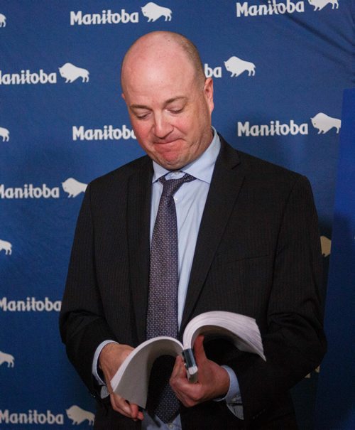 MIKE DEAL / WINNIPEG FREE PRESS
Kevin Engstrom press secretary for Kelvin Goertzen tells the gathered media after Question Period that the embargoed VIRGO report sent out in the morning was the wrong one.
180514 - Monday, May 14, 2018.