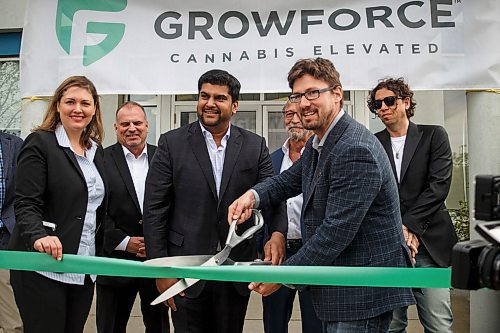 MIKE DEAL / WINNIPEG FREE PRESS
GrowForce Holdings a new Canadian cannabis company held an announcement in their newly purchased facility in the St. Boniface Industrial Park, an old meat processing facility which has sat empty for about eight years.
Rishi Gautam the CEO and Chairman at GrowForce and Matt Allard councillor for St. Boniface along with other members of the GrowForce team cut the ribbon on the new facility.
180515 - Tuesday, May 15, 2018.