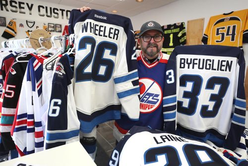 RUTH BONNEVILLE / WINNIPEG FREE PRESS


Photo of local comedian, John B. Duff, at  Keeners Jerseys on Portage Ave. who is overwhelmed with orders for Jets jerseys.  Duff has some fun in shop with jerseys. 

 For Randy Turner's story on how the Jets are putting Winnipeg in the spotlight. 
.

May 15,  2018
