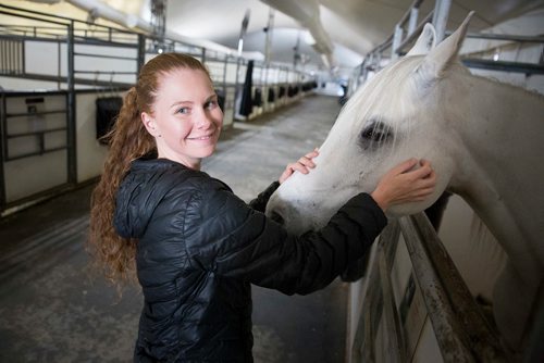 MIKE DEAL / WINNIPEG FREE PRESS
Aurelie Vozak, the logistics director of Odysseo by Cavalia, with Silver.  
180516 - Wednesday, May 16, 2018.