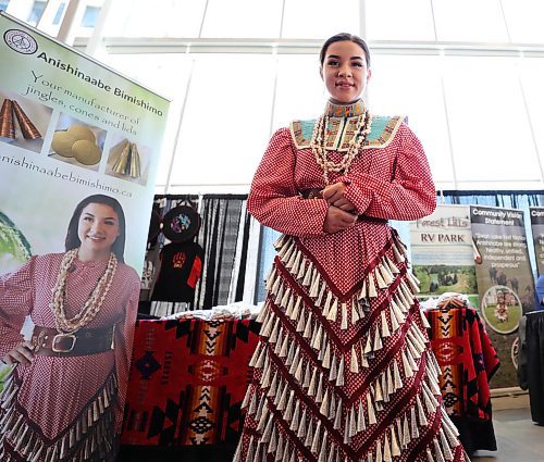 RUTH BONNEVILLE / WINNIPEG FREE PRESS

BiZ: Young, Indigenous entrepreneur, Emile McKinney from Swan Lake First Nation, shows off her jingle dress with jingles made by her company called Anishinaabe Bimishimo at Vision Quest held at the Convention Centre Wednesday.

See Martin Cash story.

May 15,  2018
