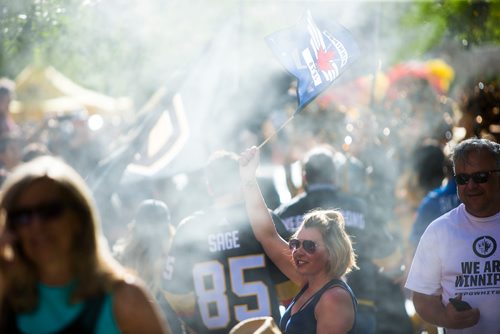 MIKAELA MACKENZIE / WINNIPEG FREE PRESS
Jets fan Jodi Martin waves a flag as the Knight's parade goes past at the T-Mobile Arena in Las Vegas on Wednesday, May 16, 2018.
Mikaela MacKenzie / Winnipeg Free Press 2018.