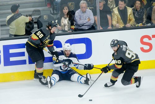 MIKAELA MACKENZIE / WINNIPEG FREE PRESS
Jets forward Paul Stastny falls as Knights forward Tomas Tatar skates away with the puck and Knights forward Erik Haula stands beside in Game 3 at the T-Mobile Arena in Las Vegas on Wednesday, May 16, 2018.
Mikaela MacKenzie / Winnipeg Free Press 2018.