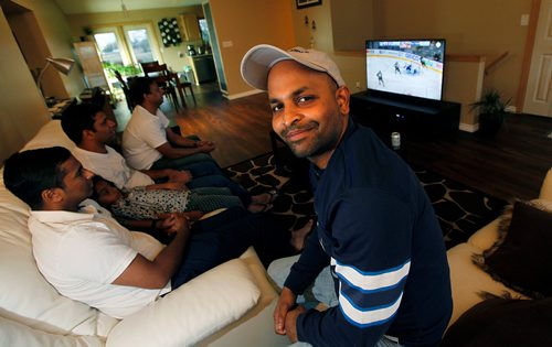 PHIL HOSSACK / WINNIPEG FREE PRESS -  Sijo Joseph watched the game with friends and family at hiome. Jessica Botelho-Urbanski story.  - MAY 8, 2018.