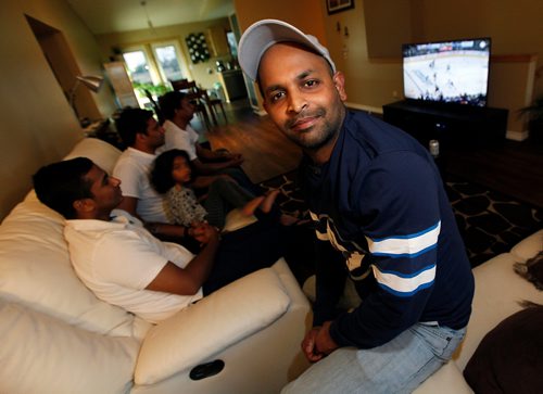 PHIL HOSSACK / WINNIPEG FREE PRESS -  Sijo Joseph watched the game with friends and family at hiome. Jessica Botelho-Urbanski story.   - MAY 8, 2018.