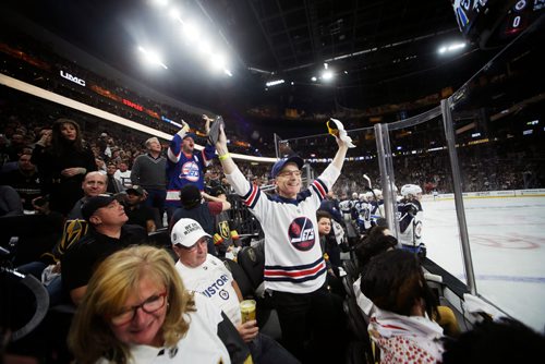 MIKAELA MACKENZIE / WINNIPEG FREE PRESS
A Jets fan cheers as the Winnipeg Jets score their first goal of the game against the Las Vegas Knights in Game 3 at the T-Mobile Arena in Las Vegas on Wednesday, May 16, 2018.
Mikaela MacKenzie / Winnipeg Free Press 2018.