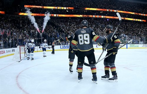 TREVOR HAGAN / WINNIPEG FREE PRESS
Vegas Golden Knights' Alex Tuch (89), celebrates after scoring on Winnipeg Jets' goaltender Connor Hellebuyck (37) during the second period of game 3 of the Western Conference Finals in Las Vegas, Nevada, Wednesday, May 16, 2018.