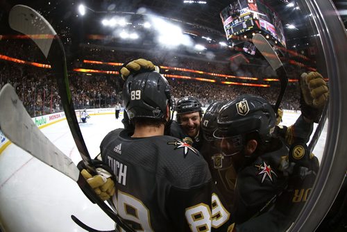 TREVOR HAGAN / WINNIPEG FREE PRESS
Vegas Golden Knights' ]Erik Haula (56), Alex Tuch (89), Colin Miller (6), Luca Sbisa (47) and James Neal (18) celebrate after Neal scored on Winnipeg Jets' goaltender Connor Hellebuyck (37) during the second period of game 3 of the Western Conference Finals in Las Vegas, Nevada, Wednesday, May 16, 2018.