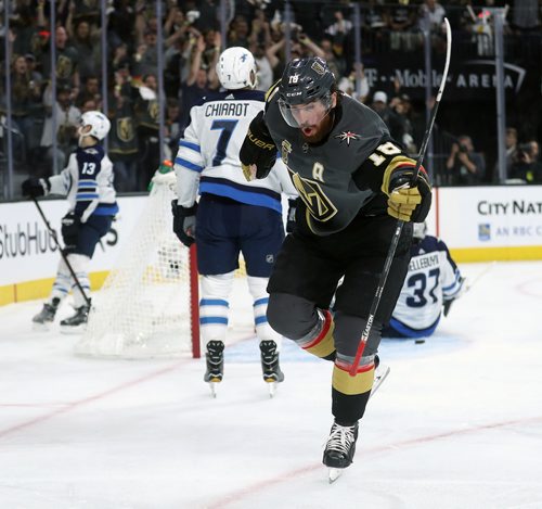 TREVOR HAGAN / WINNIPEG FREE PRESS
Vegas Golden Knights' James Neal (18) celebrates after scoring on Winnipeg Jets' goaltender Connor Hellebuyck (37) with Ben Chiarot (7), in front of the net during the second period of game 3 of the Western Conference Finals in Las Vegas, Nevada, Wednesday, May 16, 2018.