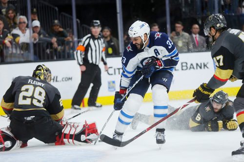 MIKAELA MACKENZIE / WINNIPEG FREE PRESS
Jets defenceman Dustin Byfuglien just misses the net in the third period of Game 3 at the T-Mobile Arena in Las Vegas on Wednesday, May 16, 2018. The game ended 2-3 for the Knights.
Mikaela MacKenzie / Winnipeg Free Press 2018.