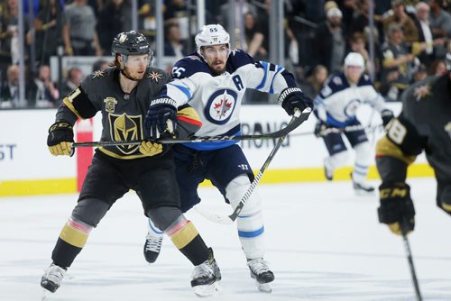 MIKAELA MACKENZIE / WINNIPEG FREE PRESS
Knights forward Cody Eakin and Jets forward Mark Scheifele go for the puck in the third period of Game 3 at the T-Mobile Arena in Las Vegas on Wednesday, May 16, 2018. The game ended 2-3 for the Knights.
Mikaela MacKenzie / Winnipeg Free Press 2018.