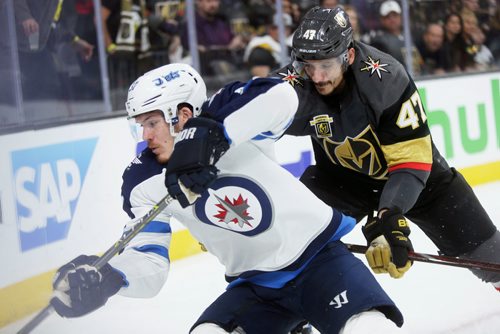MIKAELA MACKENZIE / WINNIPEG FREE PRESS
Jets forward Jack Roslovic and Knights defenceman Luca Sbisa round a corner in the third period of Game 3 at the T-Mobile Arena in Las Vegas on Wednesday, May 16, 2018. The game ended 2-3 for the Knights.
Mikaela MacKenzie / Winnipeg Free Press 2018.