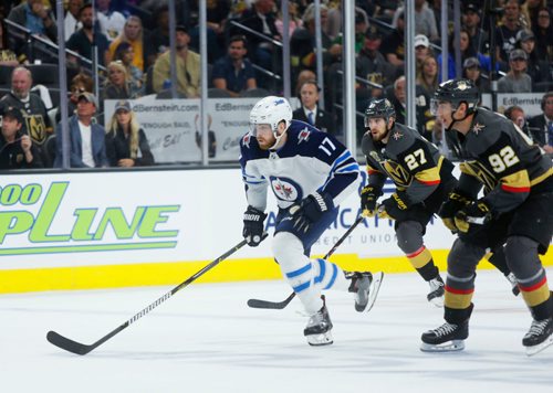 MIKAELA MACKENZIE / WINNIPEG FREE PRESS
Knights forward Tomas Nosek (right) and defenceman Shea Theodore tail Jets forward Adam Lowry in the third period of Game 3 at the T-Mobile Arena in Las Vegas on Wednesday, May 16, 2018. The game ended 2-3 for the Knights.
Mikaela MacKenzie / Winnipeg Free Press 2018.
