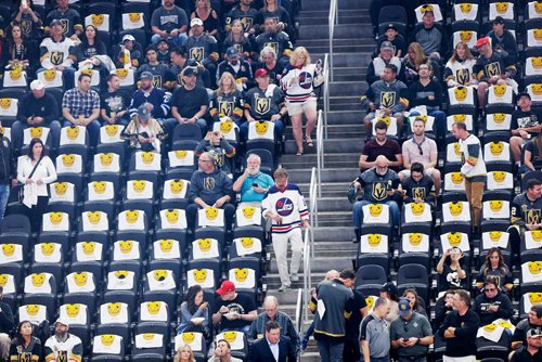 MIKAELA MACKENZIE / WINNIPEG FREE PRESS
Jets fans walk to their seats among a sea of Knights towels before the Winnipeg Jets play the Las Vegas Golden Nights in Game 3 at the T-Mobile Arena in Las Vegas on Wednesday, May 16, 2018.
Mikaela MacKenzie / Winnipeg Free Press 2018.