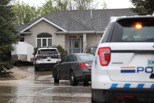 RUTH BONNEVILLE / WINNIPEG FREE PRESS

Winnipeg Police and RCMP vehicles are parked outside 123 Eagle Creek Drive Friday morning.  Sources say a swat team was on the scene around 10am Friday but later left.
No further information at this time.  


May 18,  2018
