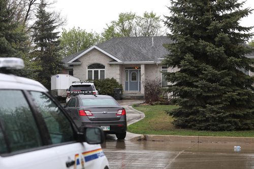 RUTH BONNEVILLE / WINNIPEG FREE PRESS

Winnipeg Police and RCMP vehicles are parked outside 123 Eagle Creek Drive Friday morning.  Sources say a swat team was on the scene around 10am Friday but later left.
No further information at this time.  


May 18,  2018
