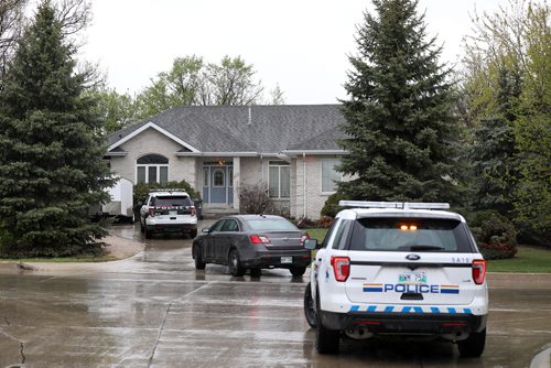 RUTH BONNEVILLE / WINNIPEG FREE PRESS

Winnipeg Police and RCMP vehicles are parked outside 123 Eagle Creek Drive Friday morning.  Sources say a swat team was on the scene around 10am Friday but later left.
No further information at this time.  


May 18,  2018
