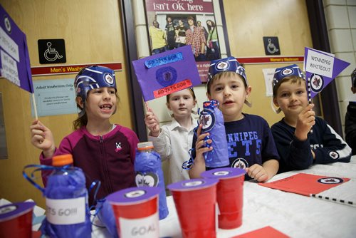 MIKE DEAL / WINNIPEG FREE PRESS
Kindergarten students at Island Lakes School made a bunch of Jets cheer gear and are giving the items to other students who bring in food for Winnipeg Harvest Friday morning.  
180518 - Friday, May 18, 2018.