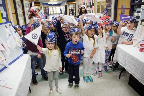 MIKE DEAL / WINNIPEG FREE PRESS
Kindergarten students at Island Lakes School made a bunch of Jets cheer gear and are giving the items to other students who bring in food for Winnipeg Harvest Friday morning.  
180518 - Friday, May 18, 2018.