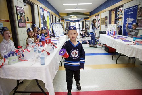 MIKE DEAL / WINNIPEG FREE PRESS
Kindergarten students at Island Lakes School made a bunch of Jets cheer gear and are giving the items to other students who bring in food for Winnipeg Harvest Friday morning.  
180518 - Friday, May 18, 2018.