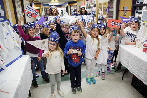 MIKE DEAL / WINNIPEG FREE PRESS
Kindergarten students at Island Lakes School made a bunch of Jets cheer gear and are giving the items to other students who bring in food for Winnipeg Harvest Friday morning.  
180518 - Friday, May 18, 2018.