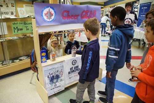 MIKE DEAL / WINNIPEG FREE PRESS
Kindergarten students at Island Lakes School made a bunch of Jets cheer gear and are giving the items to other students who bring in food for Winnipeg Harvest Friday morning.  
180518 - Friday, May 18, 2018.