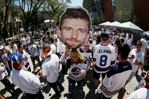 JOHN WOODS/ WINNIPEG FREE PRESS
Marnie Maclean carries Winnipeg Jets Blake Wheeler's (26) head at the White Out Street Party prior to game five action between the Winnipeg Jets and the Vegas Golden Knights in the NHL Western Conference Final in Winnipeg on Sunday, May 20, 2018.