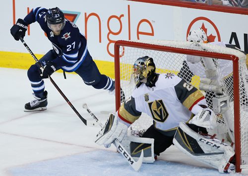 JOHN WOODS/ WINNIPEG FREE PRESS
Winnipeg Jets' Nikolaj Ehlers (27) attempts the \wraparound on Vegas Golden Knights goaltender Marc-Andre Fleury (29) during first period of game five action in the NHL Western Conference Final in Winnipeg on Sunday, May 20, 2018.