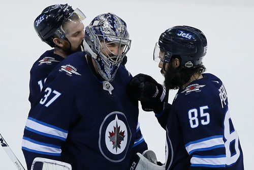 JOHN WOODS/ WINNIPEG FREE PRESS
Winnipeg Jets goaltender Connor Hellebuyck (37) and Mathieu Perreault (85) lose game five and the NHL Western Conference Final against the Vegas Golden Knights in Winnipeg on Sunday, May 20, 2018.