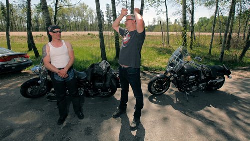 PHIL HOSSACK / WINNIPEG FREE PRESS - Brad Soutter (left) and Blake Harris took their rides toPingrove Rest Stop and signed the petition to keep it open Tuesday afternoon as a steady stream of traffic pulled in to use the facilities.  - MAY 17, 2018.