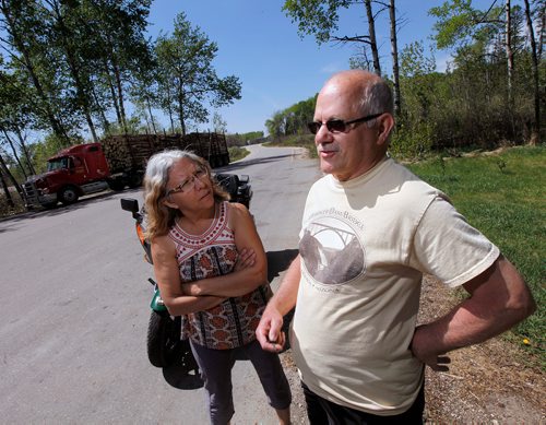 PHIL HOSSACK / WINNIPEG FREE PRESS - Maurice and Lorraine Plourde rode their motorcycle into  he Pinegrove Rest Stop parking lot and signed the petition to keep it open Tuesday afternoon as a steady stream of traffic pulled in to use the facilities.  - MAY 17, 2018.