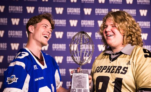 MIKAELA MACKENZIE / WINNIPEG FREE PRESS
Opposing team captains Michael O'Shae (left) and Kieran Cummings pose together at a press conference before the Senior Bowl next Saturday in Winnipeg on Wednesday, May 23, 2018.  
Mikaela MacKenzie / Winnipeg Free Press 2018.