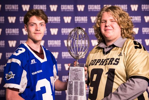 MIKAELA MACKENZIE / WINNIPEG FREE PRESS
Opposing team captains Michael O'Shae (left) and Kieran Cummings pose together at a press conference before the Senior Bowl next Saturday in Winnipeg on Wednesday, May 23, 2018.  
Mikaela MacKenzie / Winnipeg Free Press 2018.