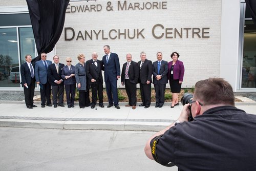 MIKE DEAL / WINNIPEG FREE PRESS
A group photo is taken with Edward and Marjorie Danylchuk, the Premier and other dignitaries during the grand opening of the new Emergency department, named the Edward and Marjorie Danylchuk Centre, at the Grace Hospital Thursday morning.  
180524 - Thursday, May 24, 2018.