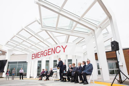 MIKE DEAL / WINNIPEG FREE PRESS
Edward and Marjorie Danylchuk sit to the right of Premier Brian Pallister while he speaks during the grand opening of the new Emergency department, named the Edward and Marjorie Danylchuk Centre, at the Grace Hospital Thursday morning.  
180524 - Thursday, May 24, 2018.