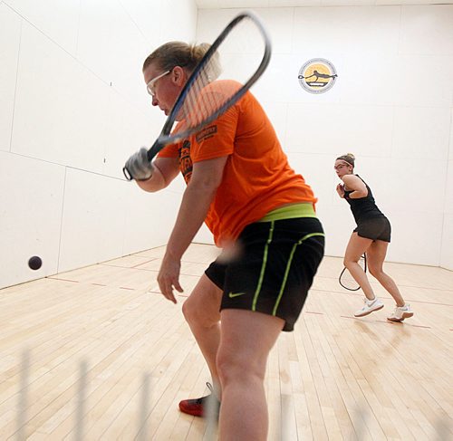 PHIL HOSSACK / WINNIPEG FREE PRESS - Jennifer Saunders (in orange) takes on Michele Morissette from Bay-Comeau Quebec in national Semi-Final raquet Ball action Thursday. Jason Bell story. - MAY 24, 2018.