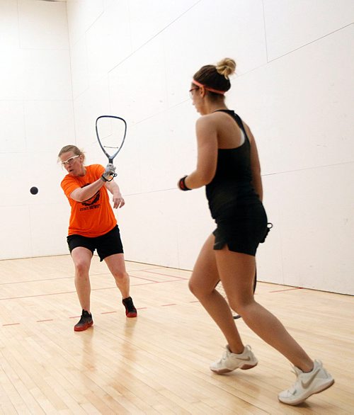 PHIL HOSSACK / WINNIPEG FREE PRESS - Jennifer Saunders (in orange) takes on Michele Morissette from Bay-Comeau Quebec in national Semi-Final raquet Ball action Thursday. Jason Bell story. - MAY 24, 2018.