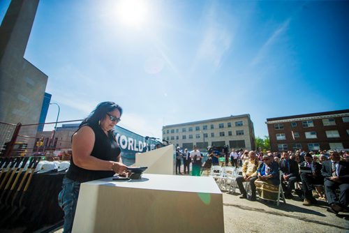 MIKAELA MACKENZIE / WINNIPEG FREE PRESS
Theresie Tungilik lights a traditional oil lamp before the Winnipeg Art Gallery breaks ground for the new Inuit Centre in Winnipeg on Friday, May 25, 2018.  
Mikaela MacKenzie / Winnipeg Free Press 2018.