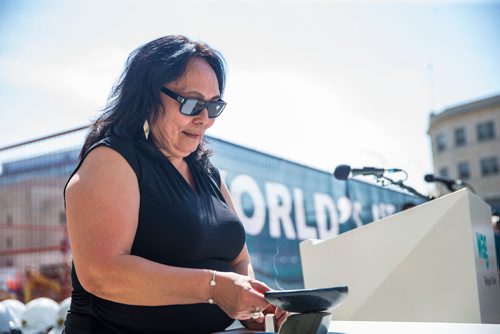 MIKAELA MACKENZIE / WINNIPEG FREE PRESS
Theresie Tungilik lights a traditional oil lamp before the Winnipeg Art Gallery breaks ground for the new Inuit Centre in Winnipeg on Friday, May 25, 2018.  
Mikaela MacKenzie / Winnipeg Free Press 2018.