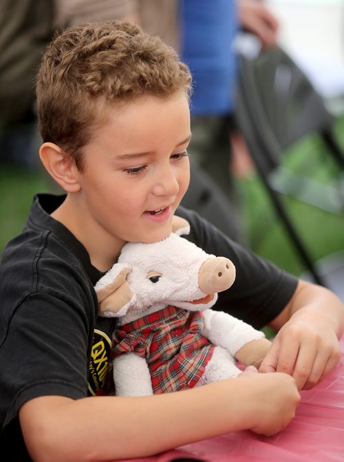 TREVOR HAGAN / WINNIPEG FREE PRESS
Zachary Morrissette, 8, and Piglet, at the Teddy Bears Picnic in Assiniboine Park, Sunday, May 27, 2018.